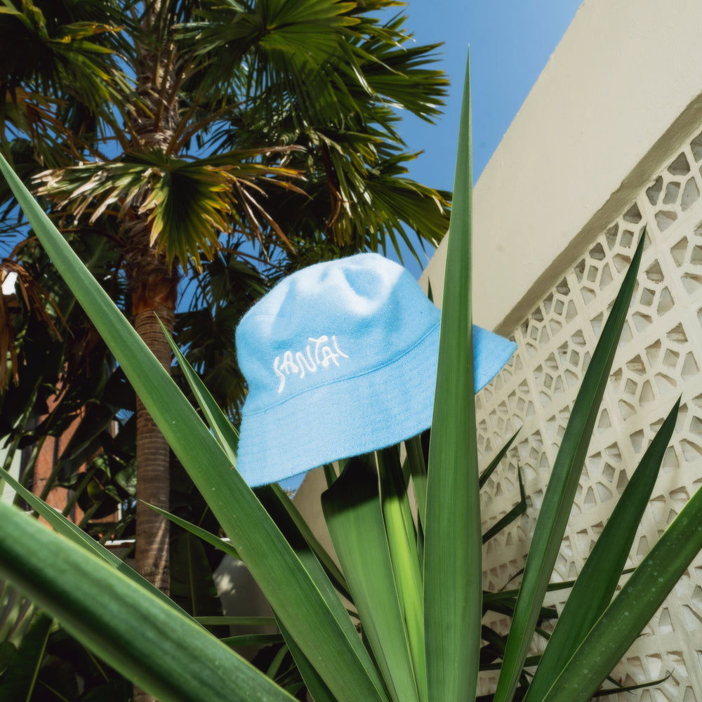 
                      
                        BLUE BUCKET HAT
                      
                    